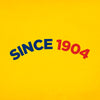 The logo displays the text SINCE 1904 in blue and red on a yellow background.