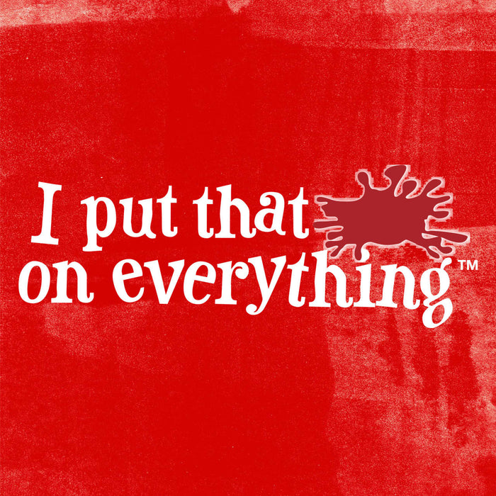 A red background with white text that reads I put that on everything with a red splatter mark next to the text.