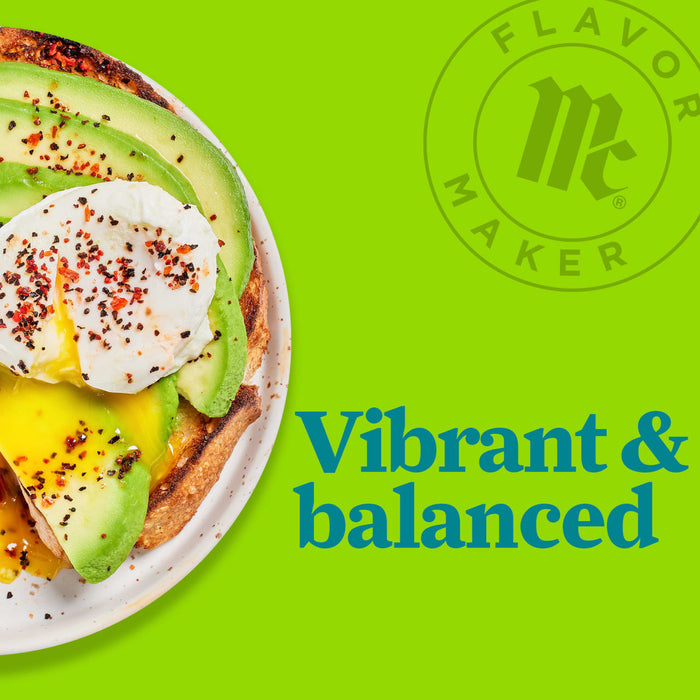 A plate of avocado toast with a poached egg and red pepper flakes, with the Flavor Maker logo in the background.