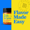 A jar of Flavor Makers chicken topping seasoning with the Flavor Maker logo in the background.