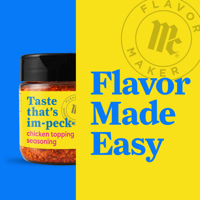 A jar of Flavor Makers chicken topping seasoning with the Flavor Maker logo in the background.