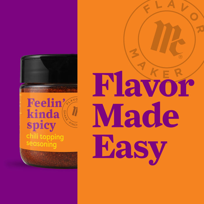 A jar of Flavor Maker Feelin\' Kinda Spicy chili topping seasoning is shown next to the Flavor Maker logo and the text Flavor Made Easy.