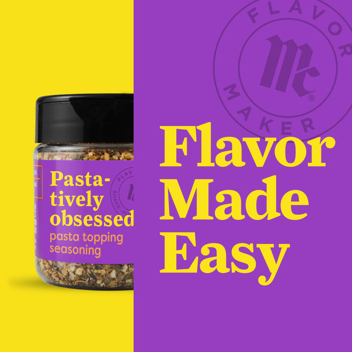A jar of Flavor Maker pasta seasoning with the words Pasta-tively obsessed and pasta topping seasoning on the label.