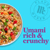 A bowl of Flavor Maker fried rice with vegetables and sesame seeds, with the text Umami rich &amp; crunchy below.