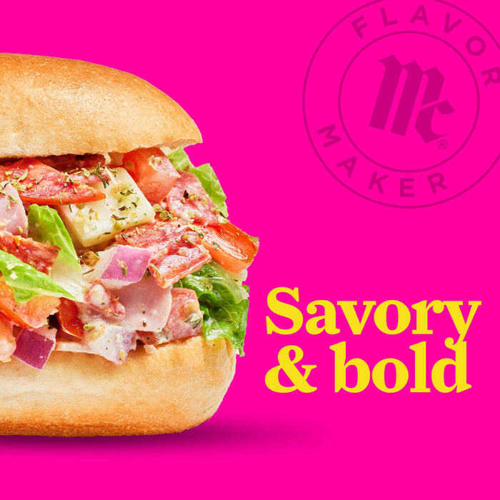 A Flavor Maker sandwich with lettuce, tomato, and salami on a white bun with the words Savory &amp; bold in yellow.