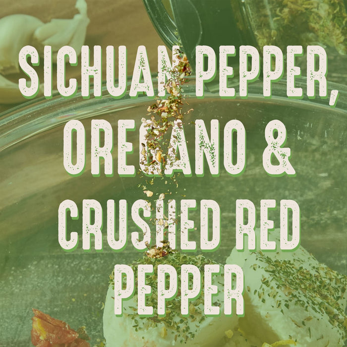 Sichuan pepper, oregano, and crushed red pepper are sprinkled on top of a dish.