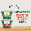 Two containers of Gourmet Garden Chopped Basil, representing the Gourmet Garden Basil (Case Of 72) product, are shown stacked to highlight their convenient 'Click 'N Stack' bowl design, with a green arrow illustrating the stacking action.