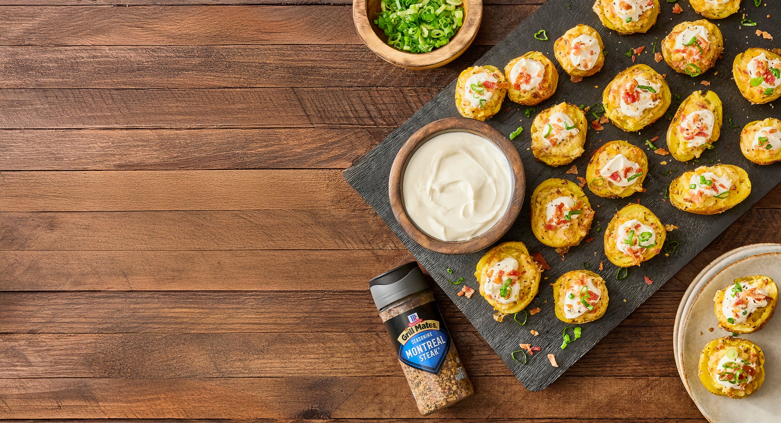 Grill mates montreal steak seasoning with potato skin bited on a wooden table