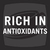 A black and white illustration of a cup of coffee with the text Rich in Antioxidants on top.