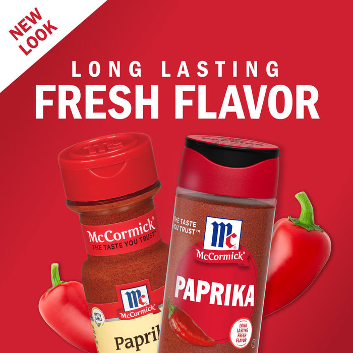 Two McCormick Paprika spice jars with red peppers.