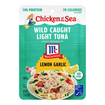 Packaged tuna salad with lemon garlic flavor on a white background