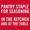 White text on a red background reads Pantry Staple for Seasoning in the Kitchen and at the Table.