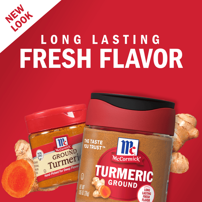 Two McCormick ground turmeric spice jars with turmeric root pieces.
