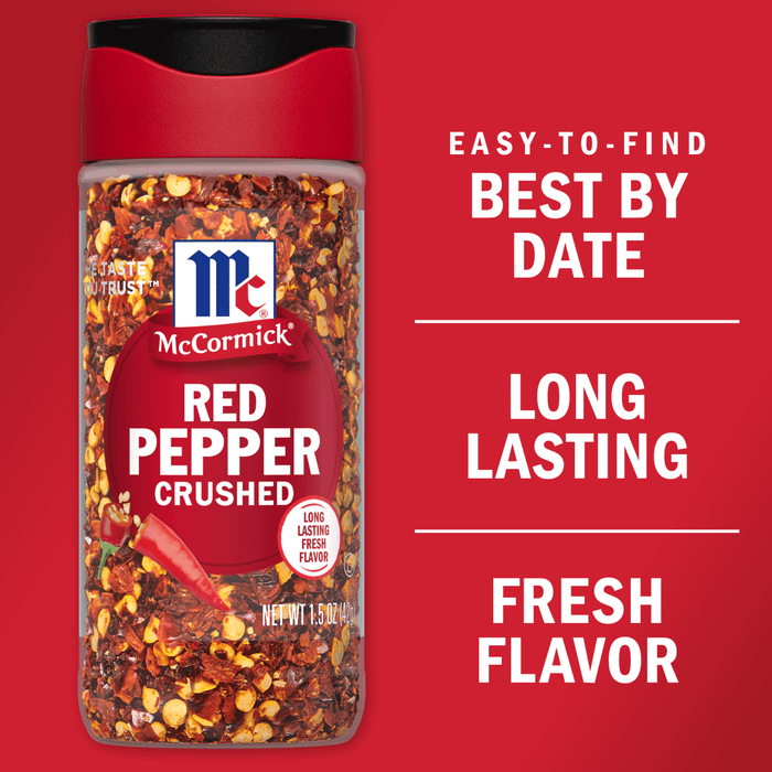 A bottle of McCormick Red Pepper Crushed with a red background and text that says Easy-to-find Best By Date, Long Lasting Fresh Flavor.