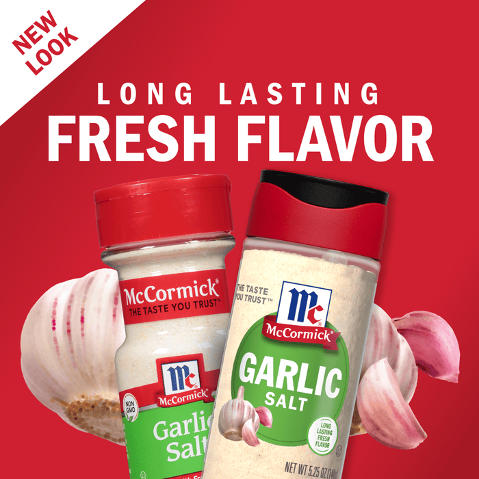 Two McCormick Garlic Salt containers with garlic cloves on a red background.