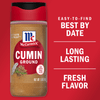 A McCormick Cumin Ground spice jar with a red lid and a red background with the words Easy-to-find Best By Date and Long Lasting Fresh Flavor on it.