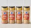 Four bottles of McCormick fall finishing sugars on a light background