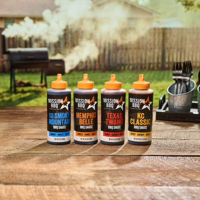 mission bbq sauce line up on a wooden table