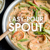 A close-up of a pan of shrimp curry with the text Easy-Pour Spout overlayed on the image.