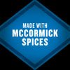 A blue diamond-shaped badge with a distressed texture, for the product Mccormick Grill Mates Gm Bourbon &amp; Oak 3.37 Oz, states MADE WITH MCCORMICK SPICES.