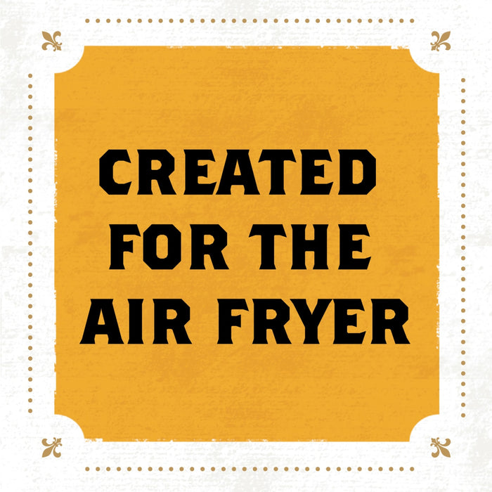 A yellow sign with a black border and fleur-de-lis in the corners reads Created for the Air Fryer.