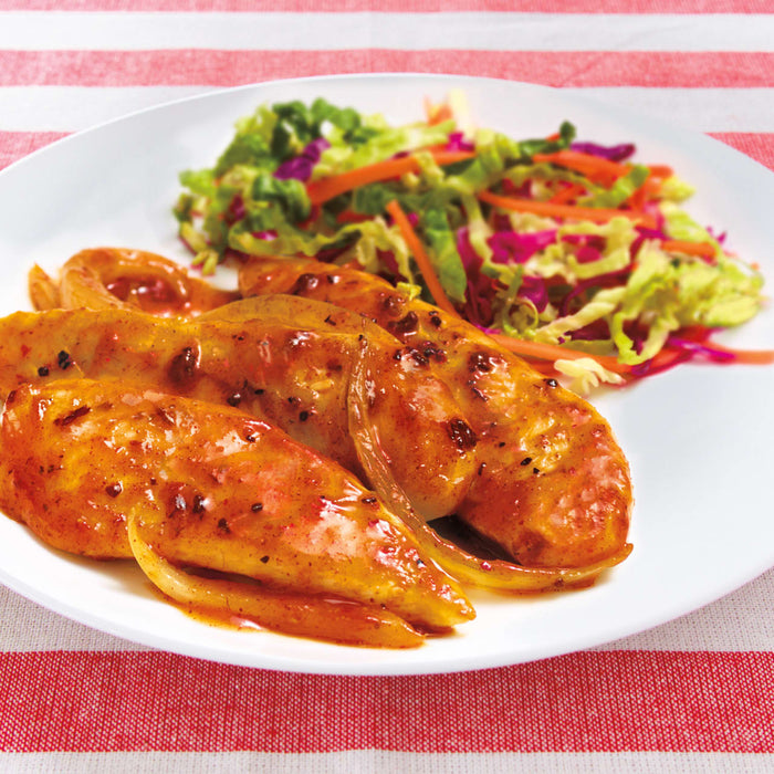 A plate of chicken with a side of coleslaw.