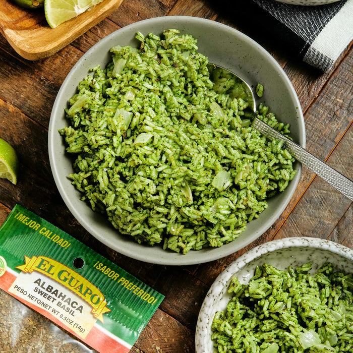 A bowl of El Guapo Albahaca Sweet Basil rice with a lime wedge and a bag of El Guapo Albahaca Sweet Basil.