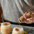 McCormick Gourmet ground cinnamon sprinkled on a spiced latte.