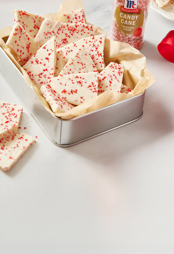 White chocolate peppermint bark topped with McCormick Candy Cane Finishing Sugar