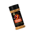 A bottle of McCormick Peruvian Roast Chicken Seasoning, featuring a black cap and a black label with red and orange text and illustrations of spices and chicken, set against a plain white background.