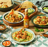 cholula on table with food