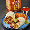 Two burritos with chicken, avocado, tomato, and cheese on a blue plate with rice and a lime wedge, next to a bottle of Cholula Hot Sauce.