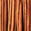 Close up of a group of cinnamon sticks.