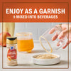 McCormick Apple Pie Spice is shown as a garnish on a beverage and mixed into a drink.