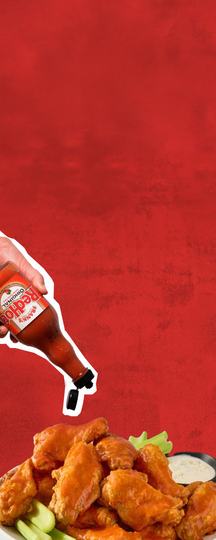 pouring frank's redhot on wings
