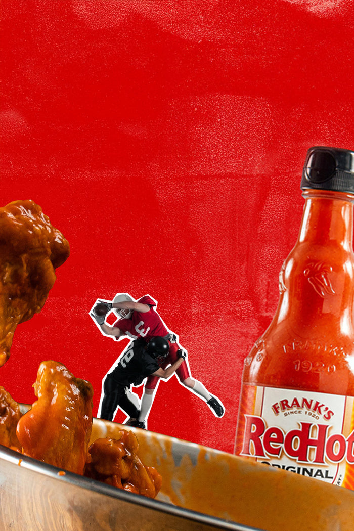 frank's redhot original with wings, and with a cut out of players tackling each other