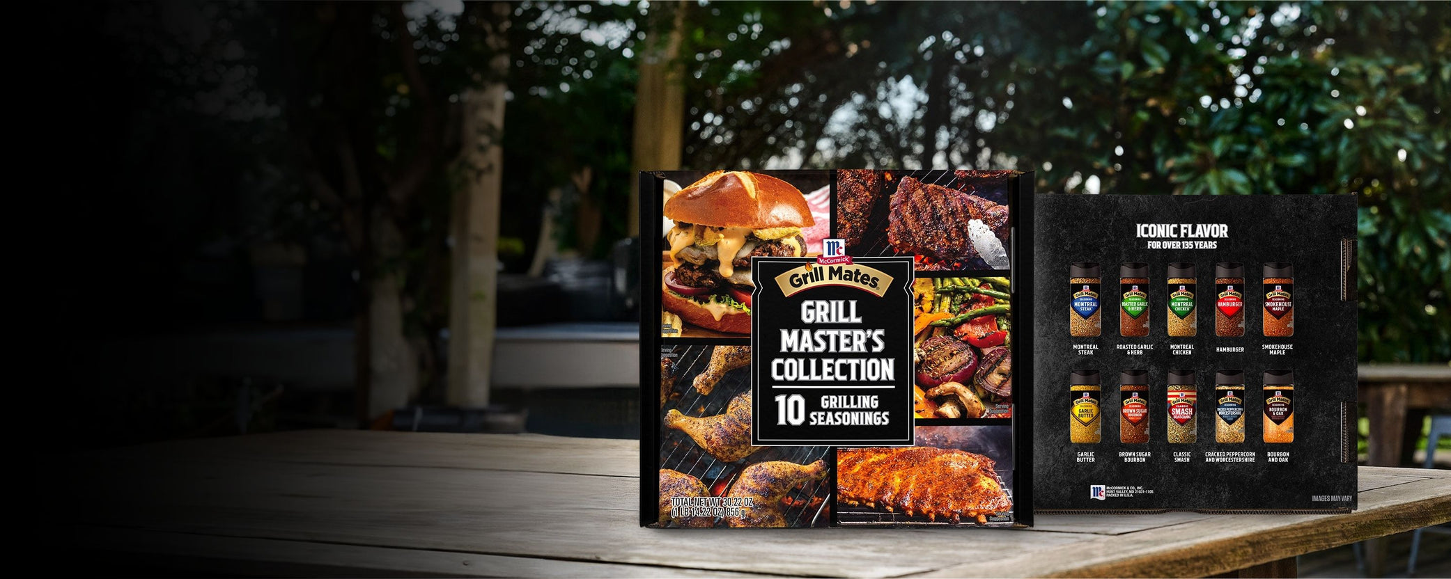 Two boxes of McCormick Grill Makers Collection seasoning on a wooden table outdoors.