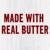 The words Made with Real Butter in red on a white wood background.