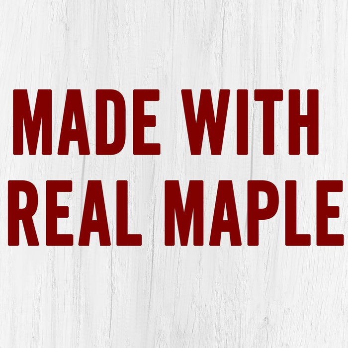 The words Made with Real Maple in red on a white wood background.