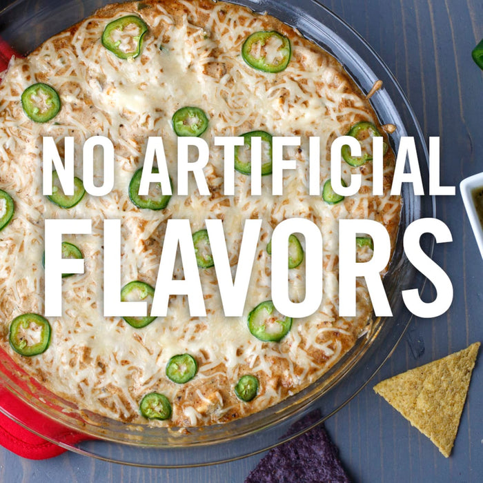 A close-up of a creamy dip with jalapenos and cheese, with the text No Artificial Flavors superimposed over the image.