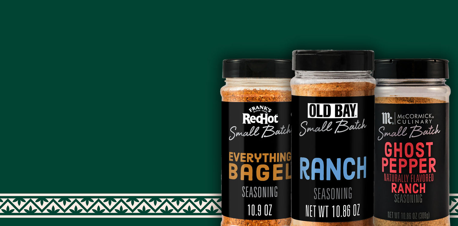 Three seasoning jars labeled on a green background.