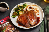 McCormick brown gravy over roast beef and mashed potatoes