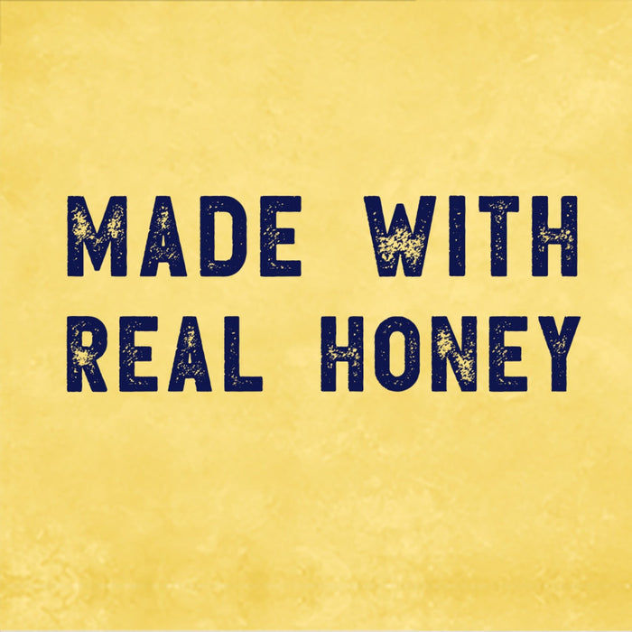 A yellow background with the text Made with Real Honey in blue.