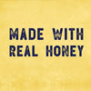 A yellow background with the text Made with Real Honey in blue.
