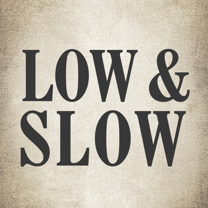The text LOW &amp; SLOW is displayed in bold black letters on a light brown background.