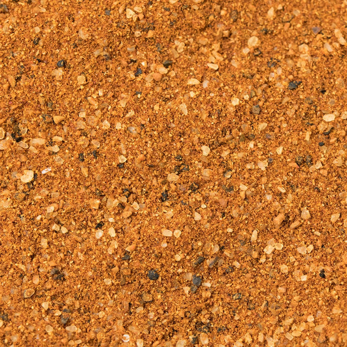 A close-up of a mixture of spices, including salt, pepper, and paprika.